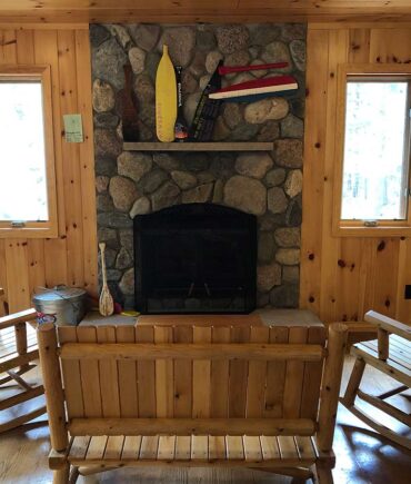 camper cabin interior with fireplace