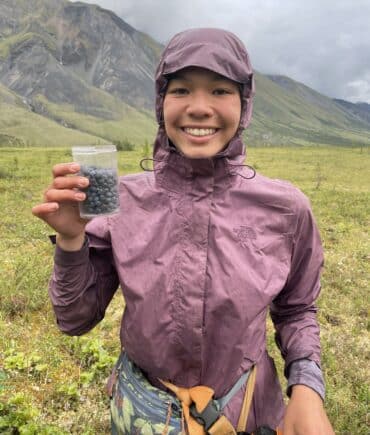 Picking blueberries on an Outpost backpack trip