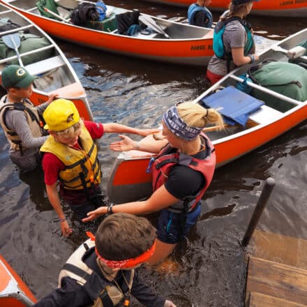 Welcome back to Camp! Campers coming in from their canoe camping trip.