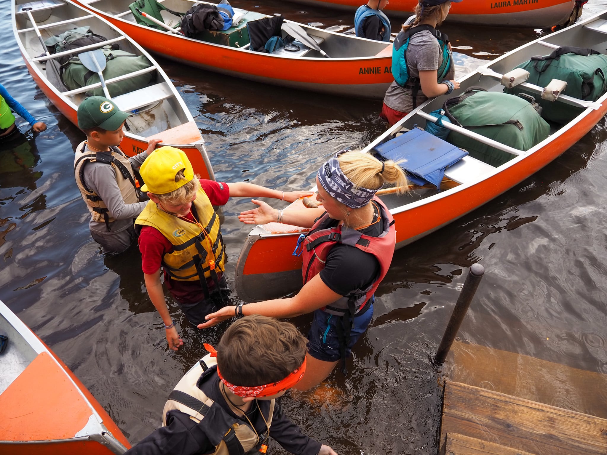 Welcome back to Camp! Campers coming in from their canoe camping trip.